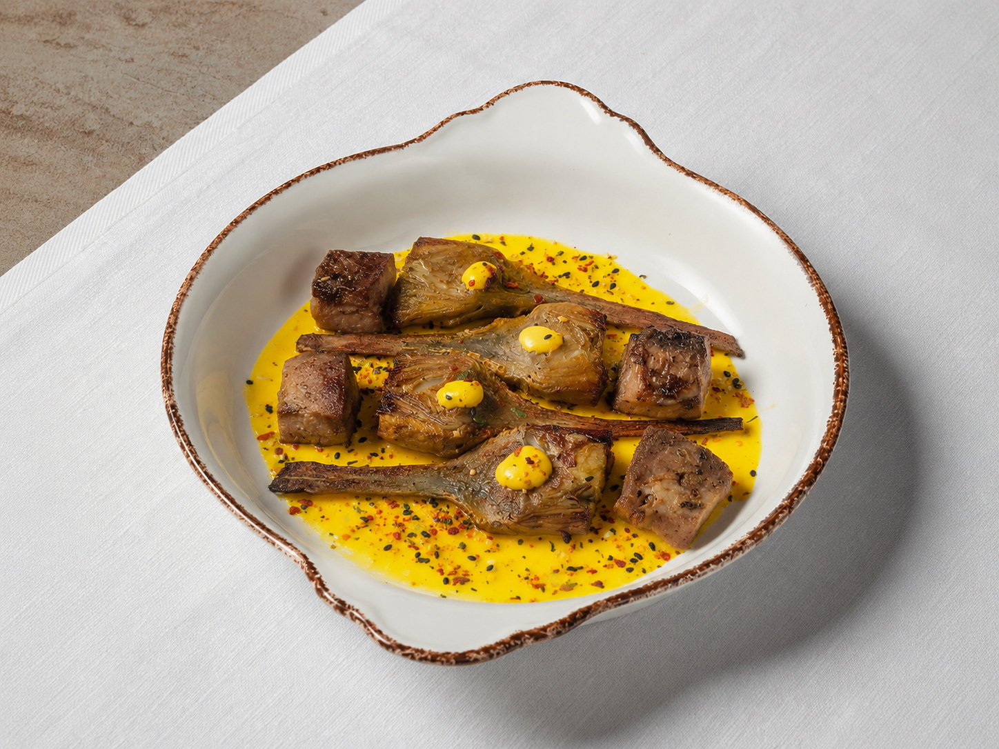 Alcachofas-con-secreto-de-Pata-Negra